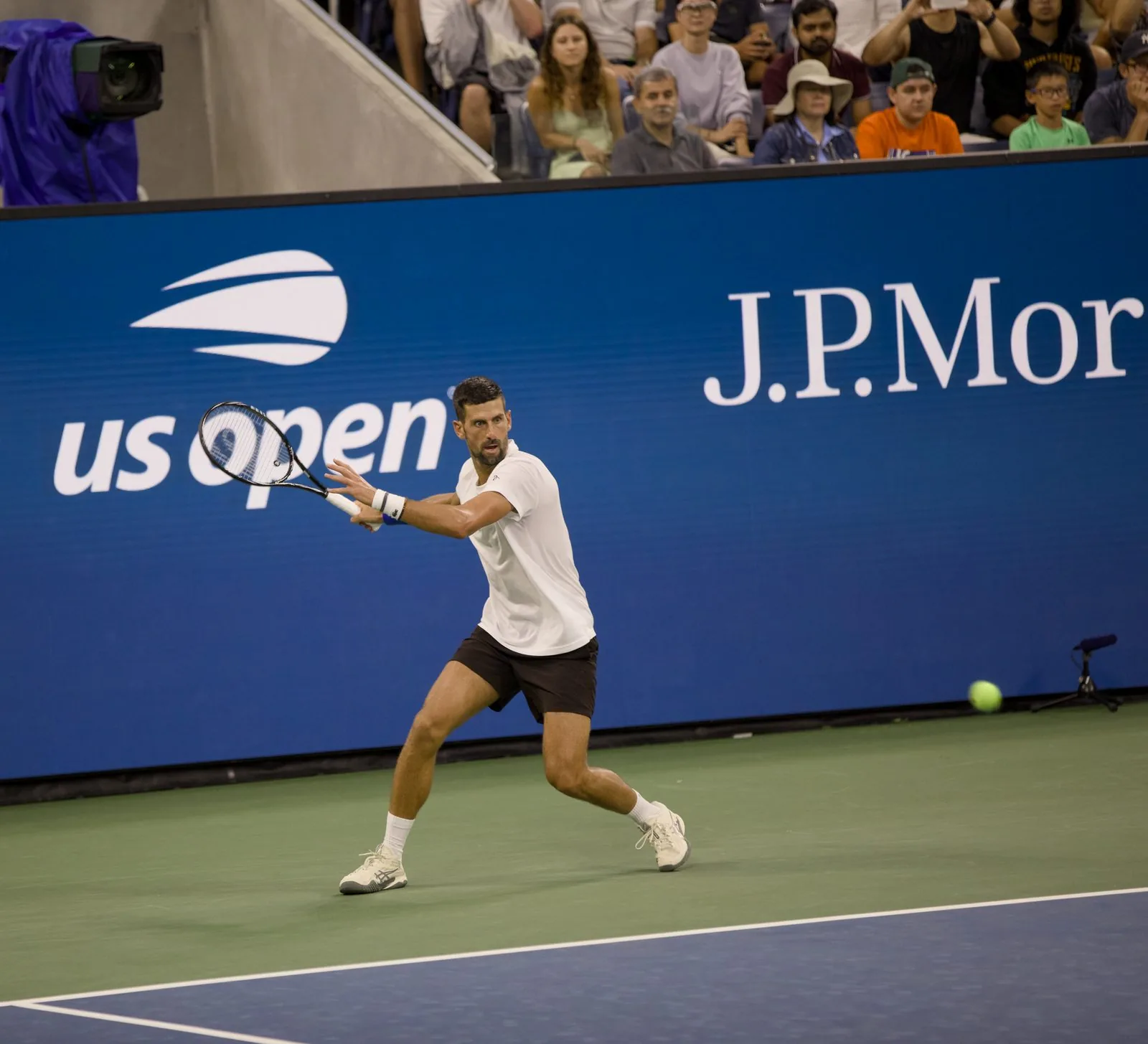 Novak Djokovic playing inside Arthur Ashe Stadium during the 2026 US Open